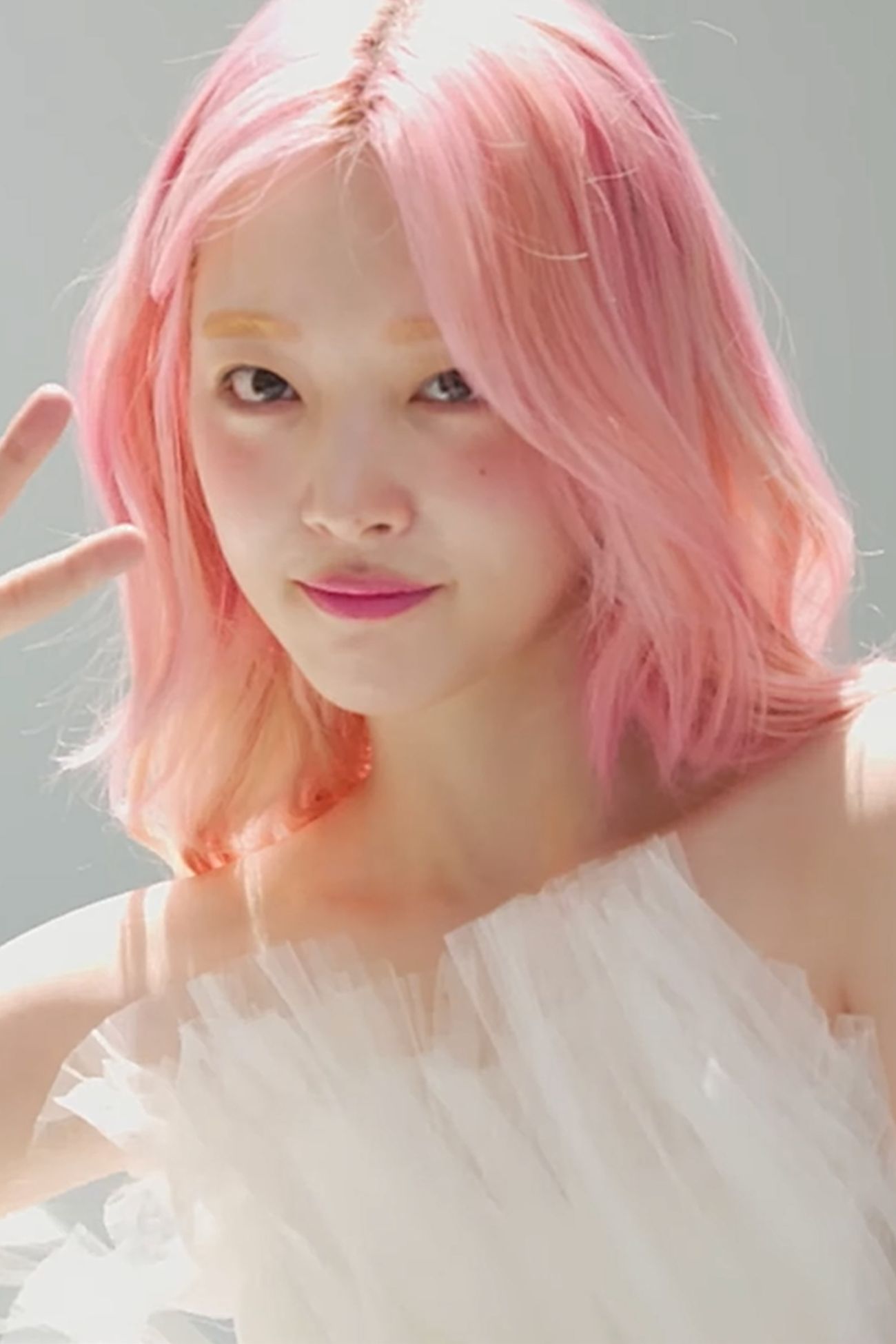 Sulli with pink hair in a 2019 Marie Claire Korea portrait